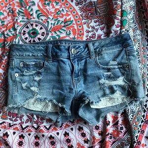 American Eagle distressed super low shortie size 4